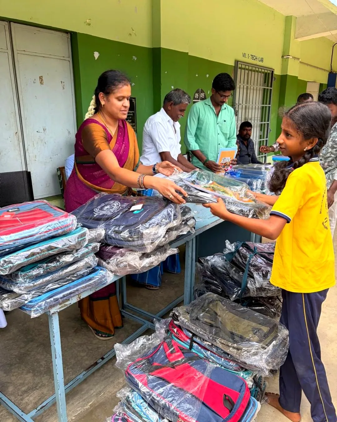 Rural Visionary Foundation volunteers with students at Kombukuttai