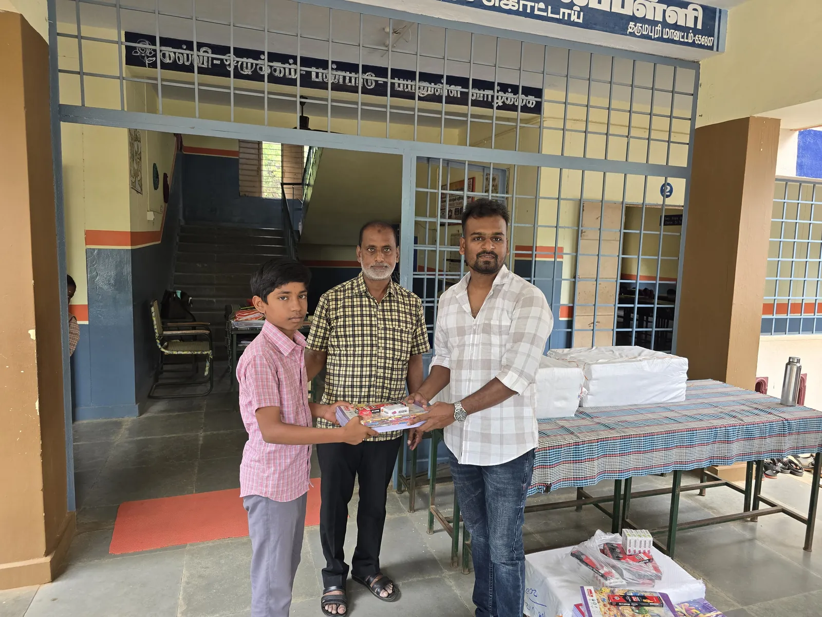 Students receiving school bags at Govt. High School, Pangunatham Kottai